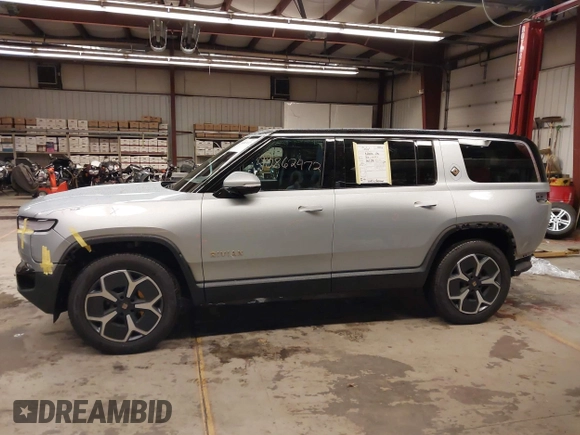 2024 Rivian R1S Adventure with VIN 7PDSGABA9RN039601, listed as a IAAI auction lot 40862472 with 6,186 mi miles. Bid and sale history available at carsss.com. Image 15.