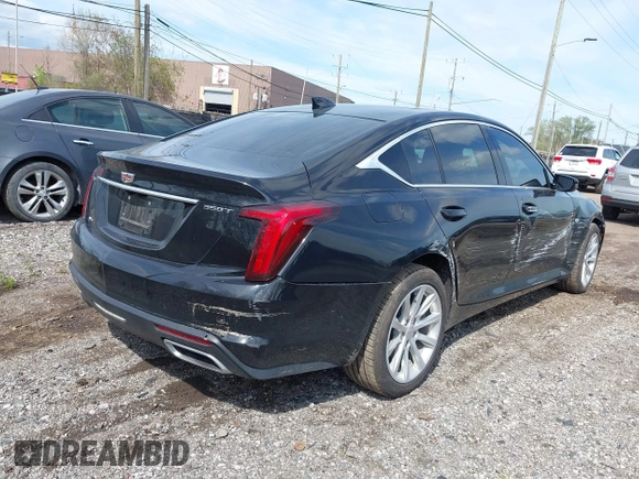 2021 Cadillac CT5 Luxury z VIN 1G6DX5RKXM0146235, wystawiony jako IAAI lot #42214676 z przebiegiem 72 847 mil mil oraz . Historia ofert i sprzedaży dostępna na DreamBid. Obrazek 4.