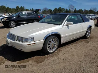 2000 Cadillac Eldorado Touring ETC z VIN 1G6ET1296YU164505, wystawiony jako Copart lot #52955795 z przebiegiem 54 761 mil mil oraz Szkoda całkowita • Salvage title. Historia ofert i sprzedaży dostępna na DreamBid. Obrazek 1.