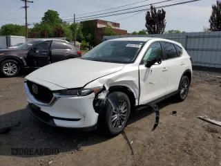 2021 Mazda CX-5 Touring z VIN JM3KFBCM8M0335280, wystawiony jako Copart lot #56457825 z przebiegiem 29 341 mil mil oraz Szkoda całkowita • Salvage title. Historia ofert i sprzedaży dostępna na DreamBid. Obrazek 1.