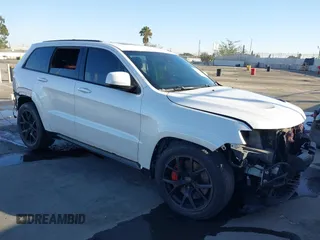 2017 Jeep Grand Cherokee SRT with VIN 1C4RJFDJ7HC600227, listed as a IAAI auction lot 41390600 with 96,841 mi miles. Bid and sale history available at carsss.com. Image 1.