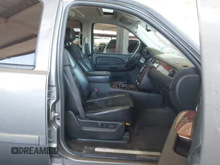 2007 Chevrolet Tahoe LTZ with VIN 1GNFK13037J331012, listed as a IAAI auction lot 42122457 with 111,130 mi miles and . Bid and sale history available at DreamBid. Image 5.