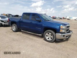 2015 Chevrolet Silverado 1500 LT with VIN 3GCUKRECXFG404530, listed as a Copart auction lot 53999645 with 146,396 mi miles and Salvage Title. Bid and sale history available at carsss.com. Image 4.