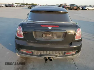 2013 MINI Coupe S z VIN WMWSX3C57DT408719, wystawiony jako Copart lot #75440574 z przebiegiem Nie podano mil oraz Szkody całkowita. Historia ofert i sprzedaży dostępna na DreamBid. Obrazek 6.