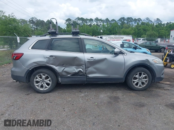 2015 Mazda CX-9 Touring z VIN JM3TB2CA1F0455916, wystawiony jako IAAI lot #42226924 z przebiegiem 157 643 mil mil oraz . Historia ofert i sprzedaży dostępna na DreamBid. Obrazek 13.