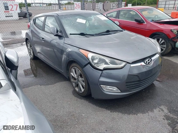 2017 Hyundai Veloster with VIN KMHTC6AD7HU305097, listed as a IAAI auction lot 41985749 with 144,753 mi miles. Bid and sale history available at carsss.com. Image 1.