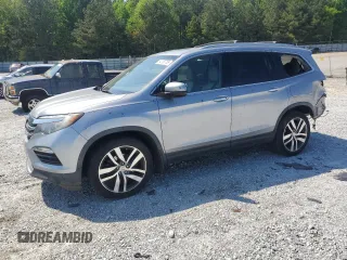 2017 Honda Pilot Touring with VIN 5FNYF5H99HB020634, listed as a Copart auction lot 54736785 with 107,219 mi miles and Salvage title. Bid and sale history available at DreamBid. Image 1.