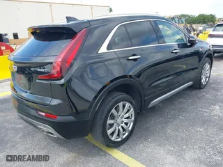2023 Cadillac XT4 FWD Premium Luxury with VIN 1GYFZCR44PF170452, listed as a IAAI auction lot 42084960 with 22,212 mi miles. Bid and sale history available at carsss.com. Image 4.
