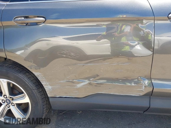 2019 Ford Edge SEL with VIN 2FMPK4J91KBC13436, listed as a IAAI auction lot 42551782 with 77,164 mi miles and . Bid and sale history available at DreamBid. Image 6.