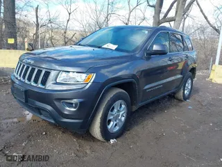 2015 Jeep Grand Cherokee Laredo with VIN 1C4RJFAG2FC133806, listed as a IAAI auction lot 41732455 with 67,955 mi miles. Bid and sale history available at carsss.com. Image 2.