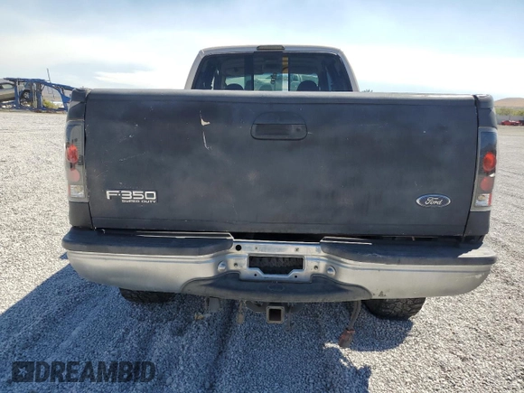 1999 Ford F-350 XL with VIN 1FTSW31S0XEC29624, listed as a Copart auction lot 70879344 with 151,680 mi miles and Salvage title. Bid and sale history available at DreamBid. Image 6.