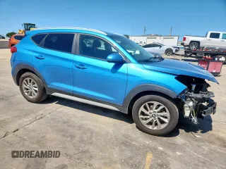 2018 Hyundai Tucson SEL with VIN KM8J3CA40JU642383, listed as a Copart auction lot 57391165 with 179,259 mi miles and Salvage title. Bid and sale history available at DreamBid. Image 4.