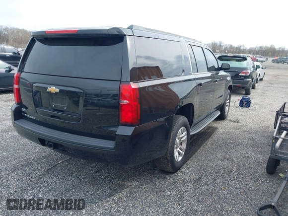 2019 Chevrolet Suburban LT with VIN 1GNSKHKC4KR405843, listed as a IAAI auction lot 41944385 with 123,071 mi miles and . Bid and sale history available at DreamBid. Image 4.