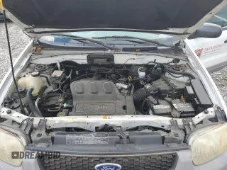 2001 Ford Escape XLS with VIN 1FMYU02161KB01283, listed as a Copart auction lot 59145105 with 86,195 mi miles and Salvage title. Bid and sale history available at DreamBid. Image 12.