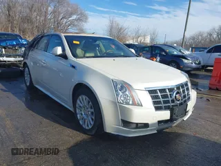 2014 Cadillac CTS with VIN 1G6DF8E5XE0183162, listed as a IAAI auction lot 41114569 with 66,484 mi miles and . Bid and sale history available at DreamBid. Image 1.
