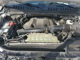 2019 Ford Expedition Platinum with VIN 1FMJU1MT6KEA23724, listed as a Copart auction lot 58489015 with 104,539 mi miles and Salvage title. Bid and sale history available at DreamBid. Image 12.