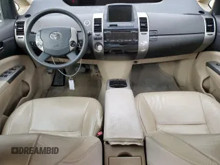 2005 Toyota Prius z VIN JTDKB20U053070122, wystawiony jako Copart lot #86879114 z przebiegiem Nie podano mil oraz Szkoda całkowita • Salvage title. Historia ofert i sprzedaży dostępna na DreamBid. Obrazek 8.