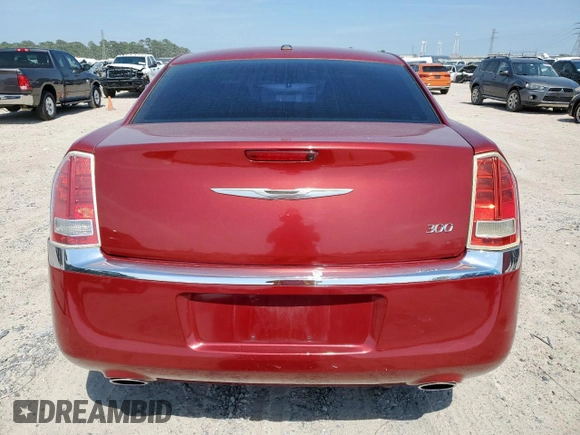 2013 Chrysler 300 z VIN 2C3CCAAG1DH568995, wystawiony jako Copart lot #56278975 z przebiegiem 133 201 mil mil oraz Szkoda całkowita • Salvage title. Historia ofert i sprzedaży dostępna na DreamBid. Obrazek 6.