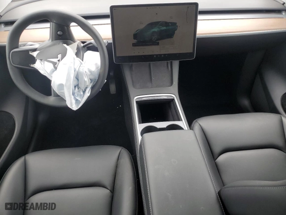 2023 Tesla Model Y Long Range with VIN 7SAYGDEE2PA096705, listed as a Copart auction lot 47790545 with 9,195 mi miles and Salvage Title. Bid and sale history available at carsss.com. Image 8.