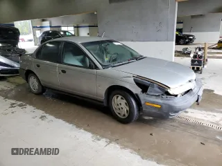 1998 Saturn SL with VIN 1G8ZF5285WZ204569, listed as a Copart auction lot 43624765 with 318,544 mi miles and Salvage Title. Bid and sale history available at carsss.com. Image 4.