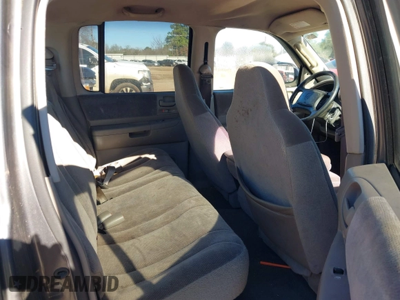 2003 Dodge Dakota SLT with VIN 1D7HL48X03S174569, listed as a IAAI auction lot 41159169 with 156,551 mi miles. Bid and sale history available at carsss.com. Image 8.