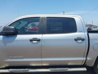 2014 Toyota Tundra SR5 z VIN 5TFEM5F15EX068560, wystawiony jako IAAI lot #42265351 z przebiegiem 163 294 mil mil oraz . Historia ofert i sprzedaży dostępna na DreamBid. Obrazek 14.