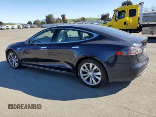 2014 Tesla Model S 60 with VIN 5YJSA1H13EFP37887, listed as a Copart auction lot 48438555 with Not provided miles and Clean title. Bid and sale history available at DreamBid. Image 2.