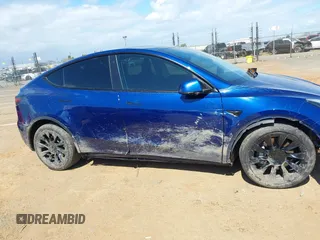 2020 Tesla Model Y Long Range with VIN 5YJYGDEF4LF000494, listed as a IAAI auction lot 41894856 with 118,638 mi miles and . Bid and sale history available at DreamBid. Image 12.