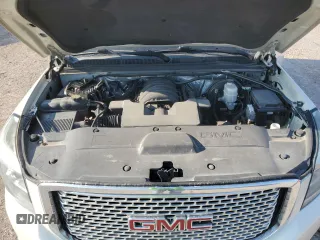 2015 GMC Yukon Denali with VIN 1GKS1CKJ0FR530006, listed as a Copart auction lot 66010184 with 140,292 mi miles and Clean Title. Bid and sale history available at carsss.com. Image 12.