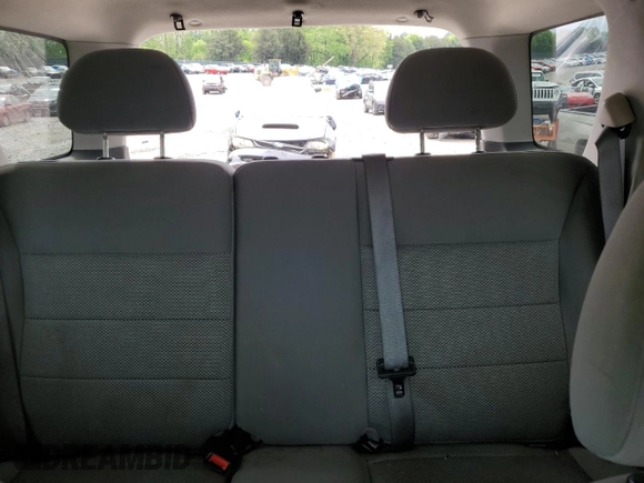 2006 Ford Escape XLT with VIN 1FMYU931X6KD09919, listed as a Copart auction lot 54403305 with 143,399 mi miles and Salvage title. Bid and sale history available at DreamBid. Image 10.