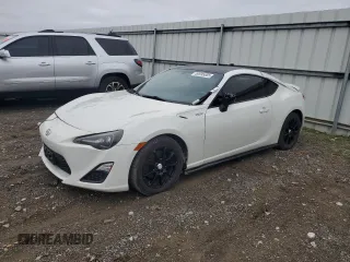 2015 Scion FR-S z VIN JF1ZNAA14F8703283, wystawiony jako Copart lot #50995885 z przebiegiem 101 033 mil mil oraz Szkoda całkowita • Salvage title. Historia ofert i sprzedaży dostępna na DreamBid. Obrazek 1.
