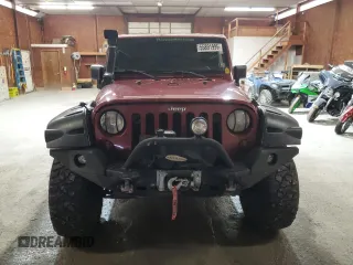 2007 Jeep Wrangler Sahara z VIN 1J4FA54127L132543, wystawiony jako Copart lot #55891995 z przebiegiem 74 616 mil mil oraz Szkoda całkowita • Salvage title. Historia ofert i sprzedaży dostępna na DreamBid. Obrazek 5.