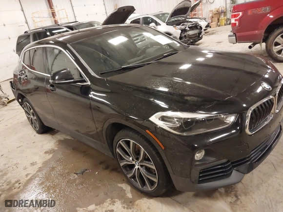 2020 BMW X2 xDrive28i with VIN WBXYJ1C07L5R28321, listed as a IAAI auction lot 41409807 with 41,296 mi miles. Bid and sale history available at carsss.com. Image 1.