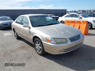 2000 Toyota Camry LE z VIN JT2BF22K5Y0258522, wystawiony jako IAAI lot #41998874 z przebiegiem 300 186 mil mil oraz . Historia ofert i sprzedaży dostępna na DreamBid. Obrazek 1.