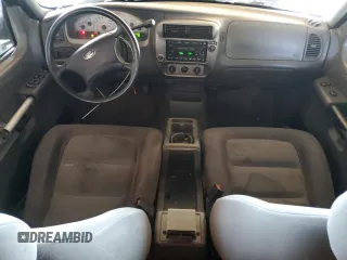 2005 Ford Explorer Sport Trac XLS с VIN 1FMZU67K15UA23188, выставлен на аукционе Copart как лот 61647445 с пробегом 212 302 миль миль и Списание • Salvage title. История ставок и продаж доступна на DreamBid. Изображение 8.
