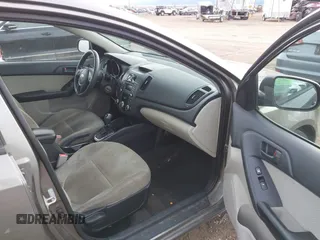 2011 Kia Forte EX with VIN KNAFU4A21B5458641, listed as a IAAI auction lot 40834309 with 149,137 mi miles. Bid and sale history available at carsss.com. Image 5.