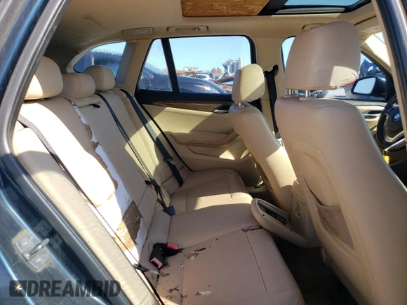 2013 BMW X1 xDrive28i with VIN WBAVL1C56DVR88434, listed as a Copart auction lot 52126925 with 136,187 mi miles and Salvage Title. Bid and sale history available at carsss.com. Image 10.