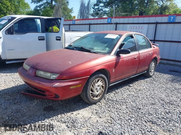 1998 Saturn SL z VIN 1G8ZK5270WZ223002, wystawiony jako IAAI lot #41959507 z przebiegiem Nie podano mil oraz . Historia ofert i sprzedaży dostępna na DreamBid. Obrazek 2.