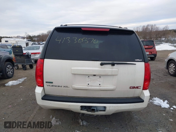 2012 GMC Yukon XL SLT with VIN 1GKS2KE79CR252581, listed as a IAAI auction lot 41330370 with 158,736 mi miles. Bid and sale history available at carsss.com. Image 16.