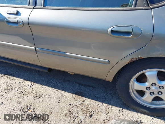 2004 Ford Taurus SE with VIN 1FAFP53224G197451, listed as a IAAI auction lot 41224109 with 290,224 mi miles and . Bid and sale history available at DreamBid. Image 6.