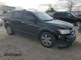 2011 Dodge Journey LUX with VIN 3D4PH9FG2BT535016, listed as a Copart auction lot 77885214 with 173,718 mi miles and Clean title. Bid and sale history available at DreamBid. Image 4.