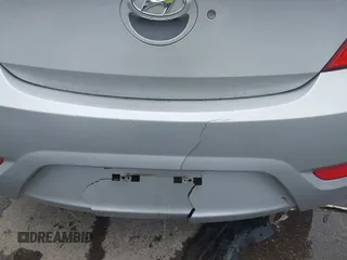 2012 Hyundai Accent SE z VIN KMHCU5AE0CU054285, wystawiony jako IAAI lot #42170678 z przebiegiem 92 172 mil mil oraz . Historia ofert i sprzedaży dostępna na DreamBid. Obrazek 12.