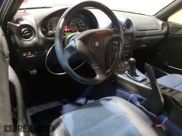 1999 Mazda MX-5 Miata with VIN JM1NB3532X0136645, listed as a Copart auction lot 59480265 with 160,936 mi miles and Clean title. Bid and sale history available at DreamBid. Image 8.