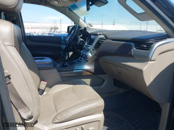 2015 Chevrolet Suburban LT with VIN 1GNSCJKC2FR281629, listed as a IAAI auction lot 41849300 with 133,842 mi miles. Bid and sale history available at carsss.com. Image 5.
