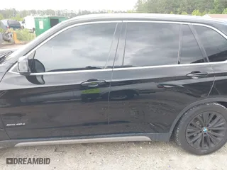 2017 BMW X5 xDrive40e iPerformance with VIN 5UXKT0C30H0V95867, listed as a IAAI auction lot 42122827 with 84,271 mi miles. Bid and sale history available at carsss.com. Image 14.