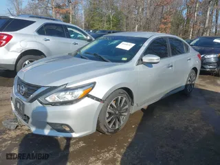 2018 Nissan Altima 2.5 SR with VIN 1N4AL3APXJC122587, listed as a IAAI auction lot 41448307 with 100,296 mi miles. Bid and sale history available at carsss.com. Image 17.