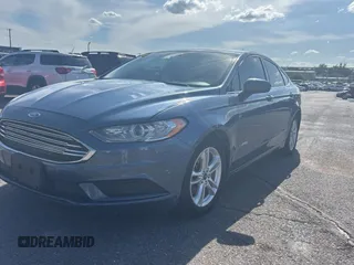 2018 Ford Fusion Hybrid SE with VIN 3FA6P0LU7JR261105, listed as a Copart auction lot 55692065 with 122,782 mi miles and Clean Title. Bid and sale history available at carsss.com. Image 2.