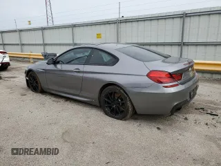 2013 BMW 6 Series 650i xDrive with VIN WBAYM1C53DDZ02397, listed as a Copart auction lot 48872655 with Not Provided miles and Salvage Title. Bid and sale history available at carsss.com. Image 2.