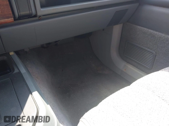1993 Jeep Cherokee Country with VIN 1J4FJ78S2PL578769, listed as a IAAI auction lot 42732237 with 102,314 mi miles and . Bid and sale history available at DreamBid. Image 6.