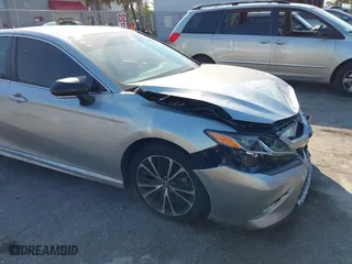 2018 Toyota Camry LE with VIN 4T1B11HK7JU099875, listed as a IAAI auction lot 41503123 with 60,202 mi miles. Bid and sale history available at carsss.com. Image 17.